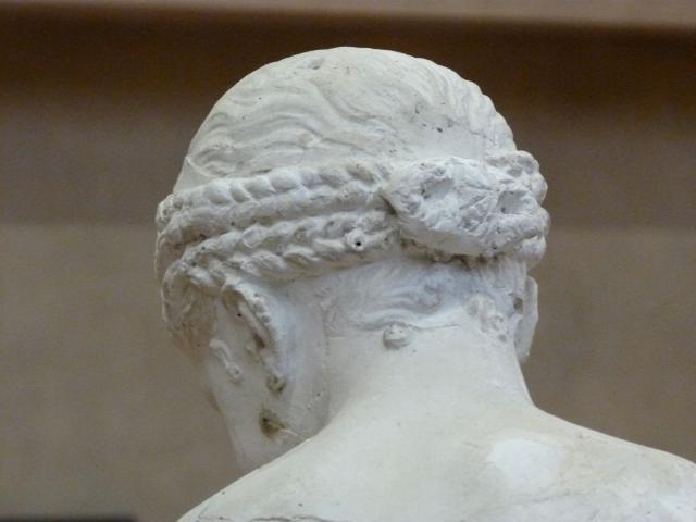 image Escultura peinado femenino