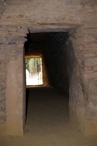 image Vista al exterior desde la entrada a la primera cámara de el Dolmen de El Romeral, Antequera, Málaga