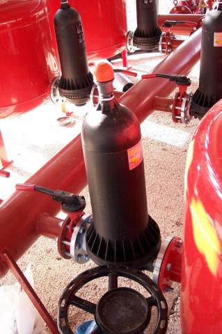 image Filtro de anillas en plantación de olivos