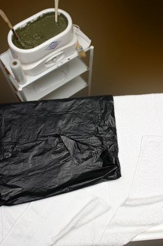 image Aplicación localizada de parafangos: colocación de toallas y envoltura