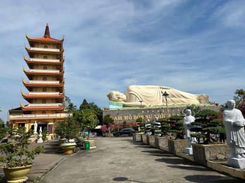 image Representación de Buda tumbado