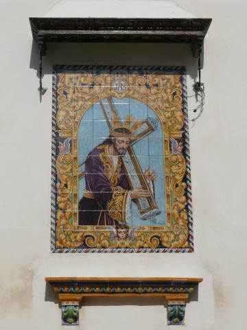 image Azulejos pintados con la imagen de Cristo, fachada de la Iglesia de San Sebastián, Estepa, Sevilla