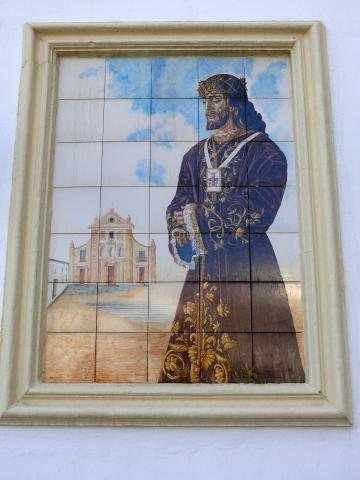 image Azulejos decorados con la imagen de un Cristo Nazareno en la Iglesia de la Trinidad, Antequera, Málaga