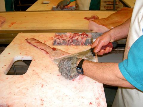 image Limpieza de las partes del cerdo