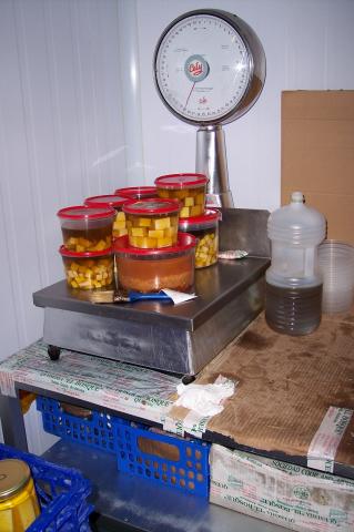 image Pesando quesos